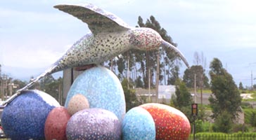 Sculpture of a hummingbird over condor eggs