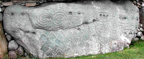 Swirls and lozenge shapes on a rock