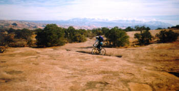 Cori biking at Gemini Bridges